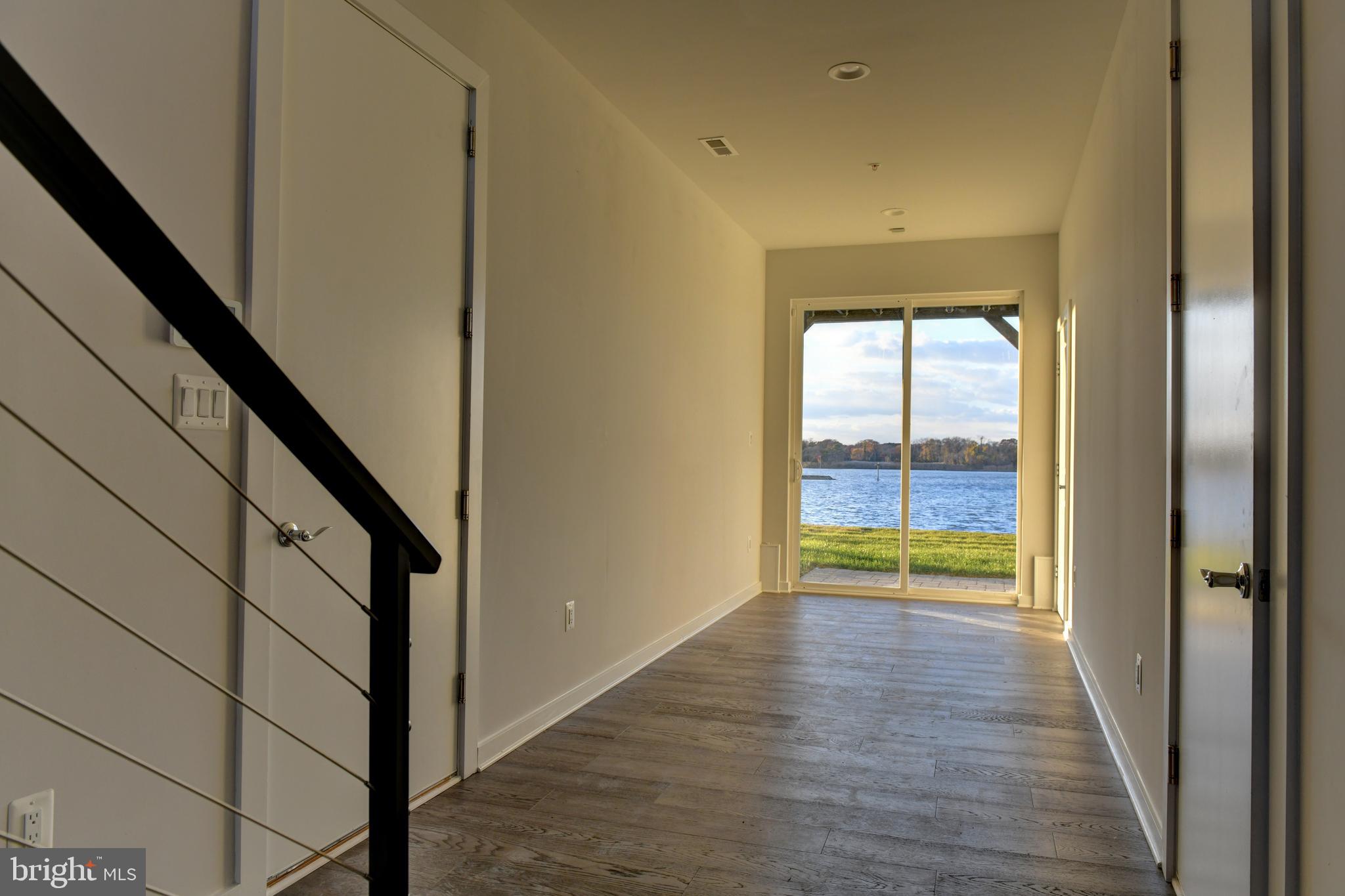 8082 Ventnor Road Pasadena, MD 21122 - Photo 34 of 74 Ground Floor Exit to Pier & Garage Access