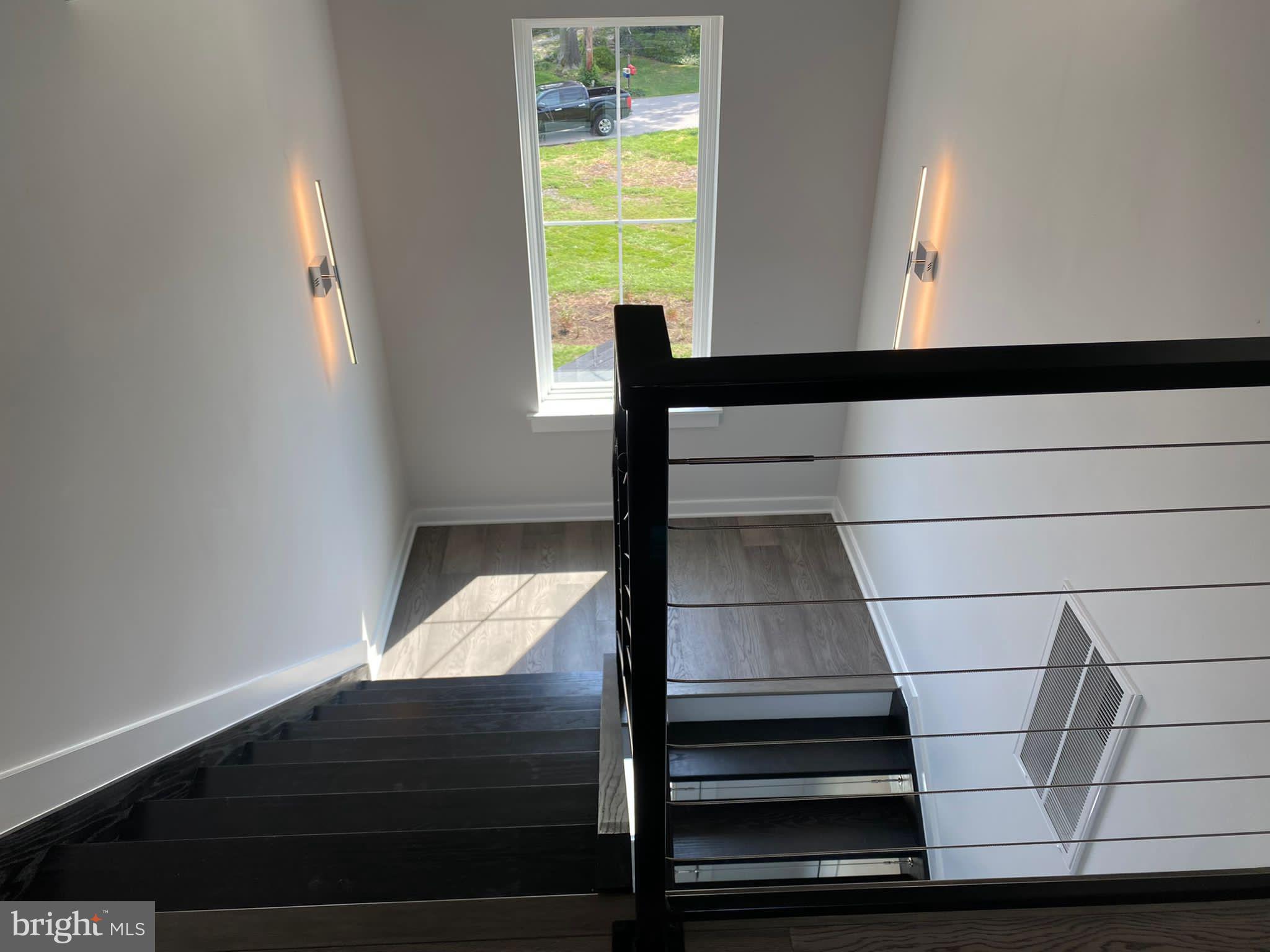 8082 Ventnor Road Pasadena, MD 21122 - Photo 38 of 74 stairs leading from 2nd to 1st floor