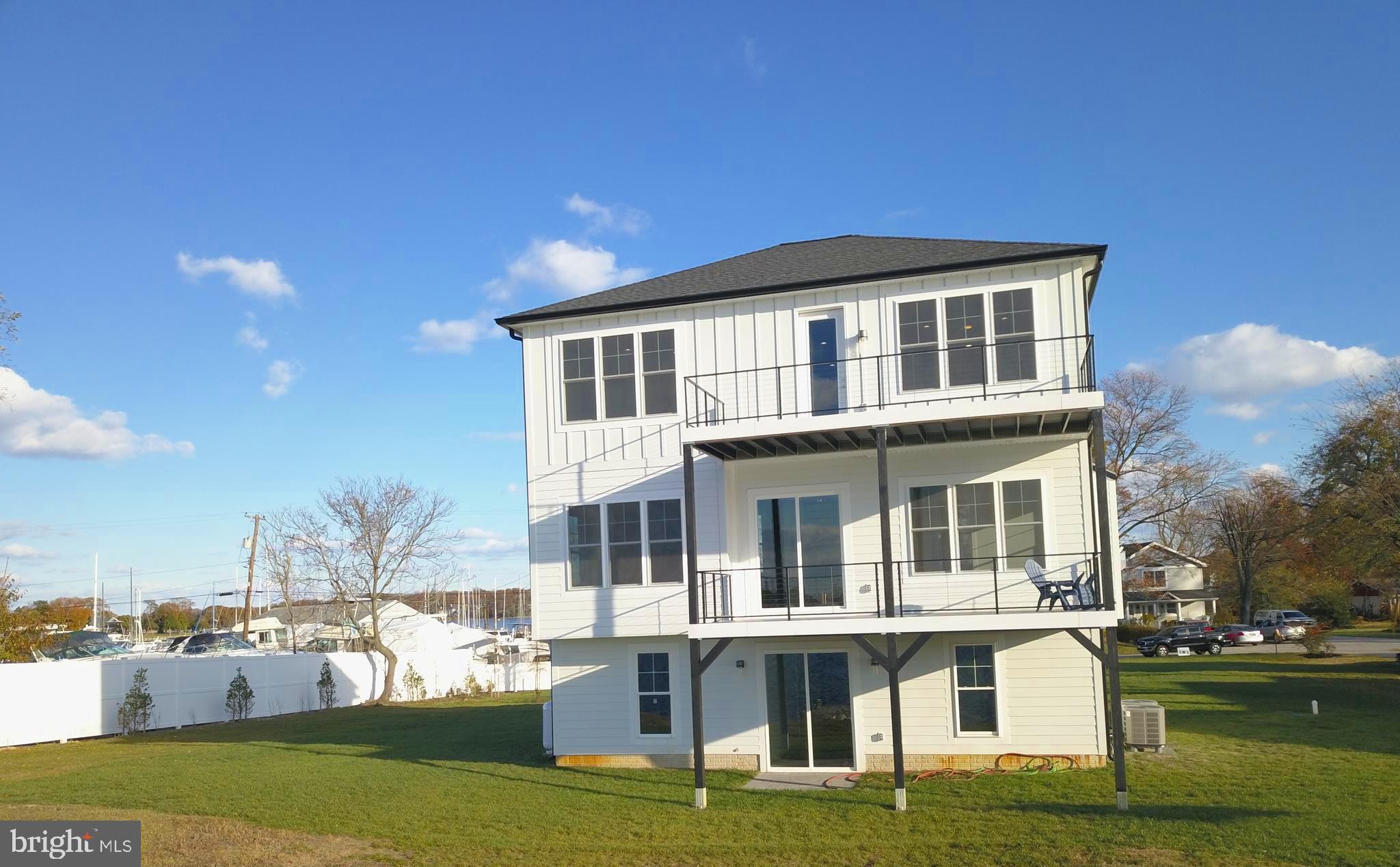 8082 Ventnor Road Pasadena, MD 21122 - Photo 63 of 74 Back of the house & 8ft Privacy Fence