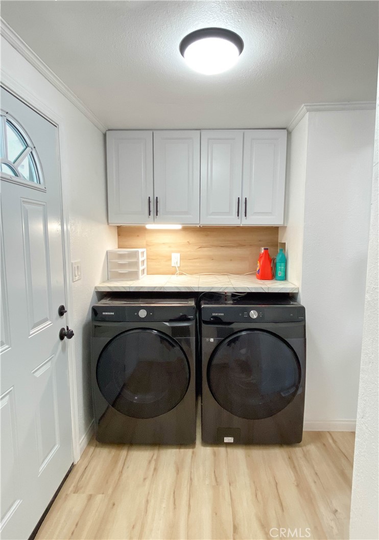 8723 Artesia Boulevard, Unit 7 Bellflower, CA 90706 - Photo 9 of 10 a kitchen with a stove and a sink