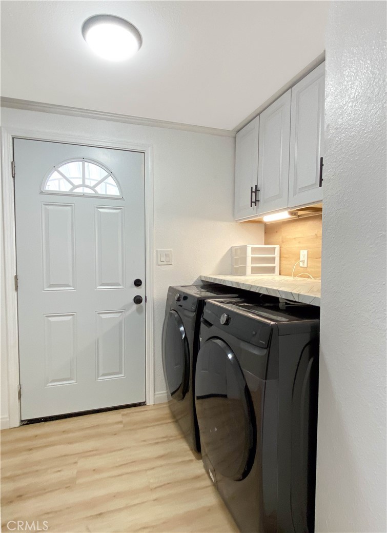 8723 Artesia Boulevard, Unit 7 Bellflower, CA 90706 - Photo 10 of 10 a utility room with cabinets