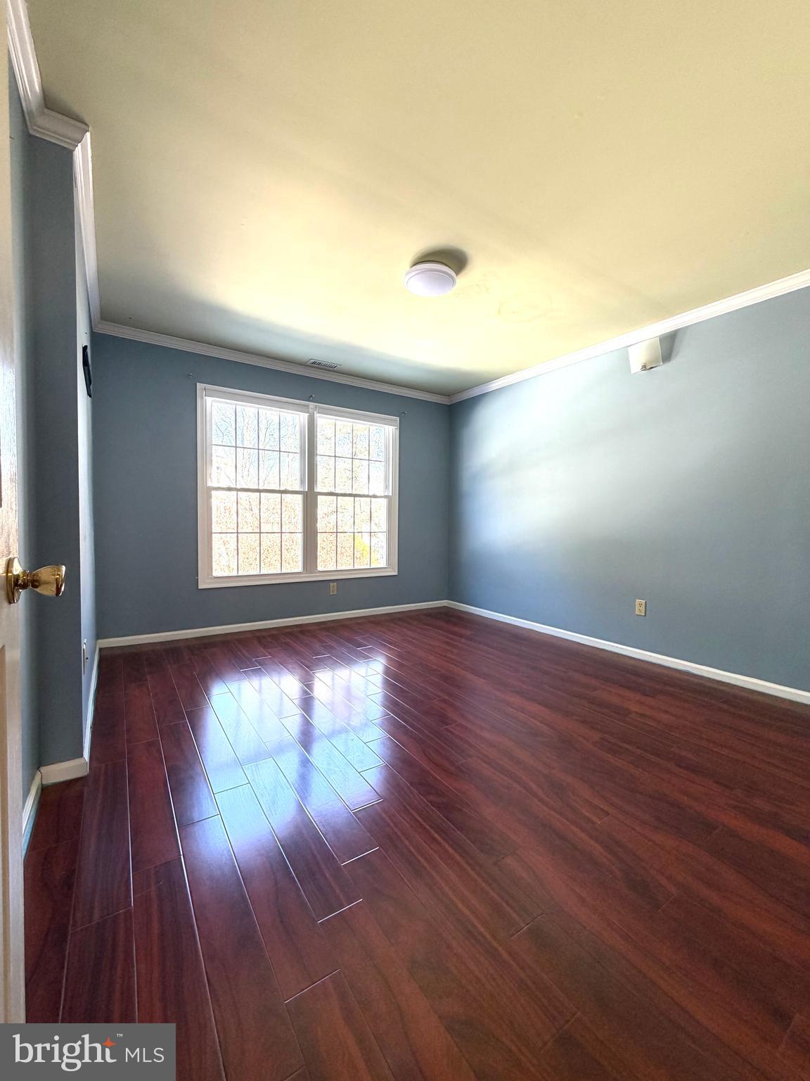 3 Kaylin Corner Chalfont, PA 18914 - Photo 19 of 27 an empty room with wooden floor and windows