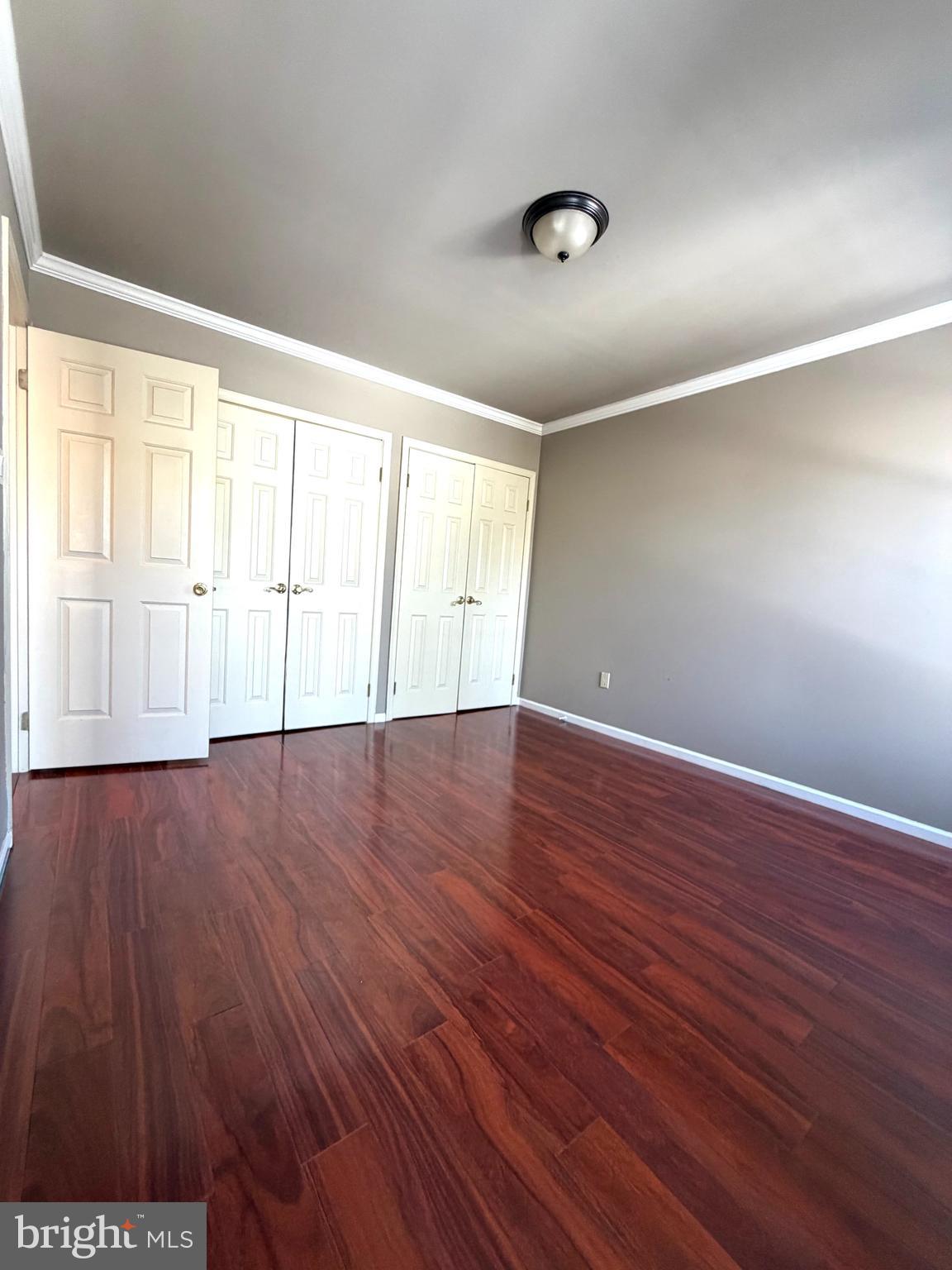 3 Kaylin Corner Chalfont, PA 18914 - Photo 21 of 27 an empty room with wooden floor and windows