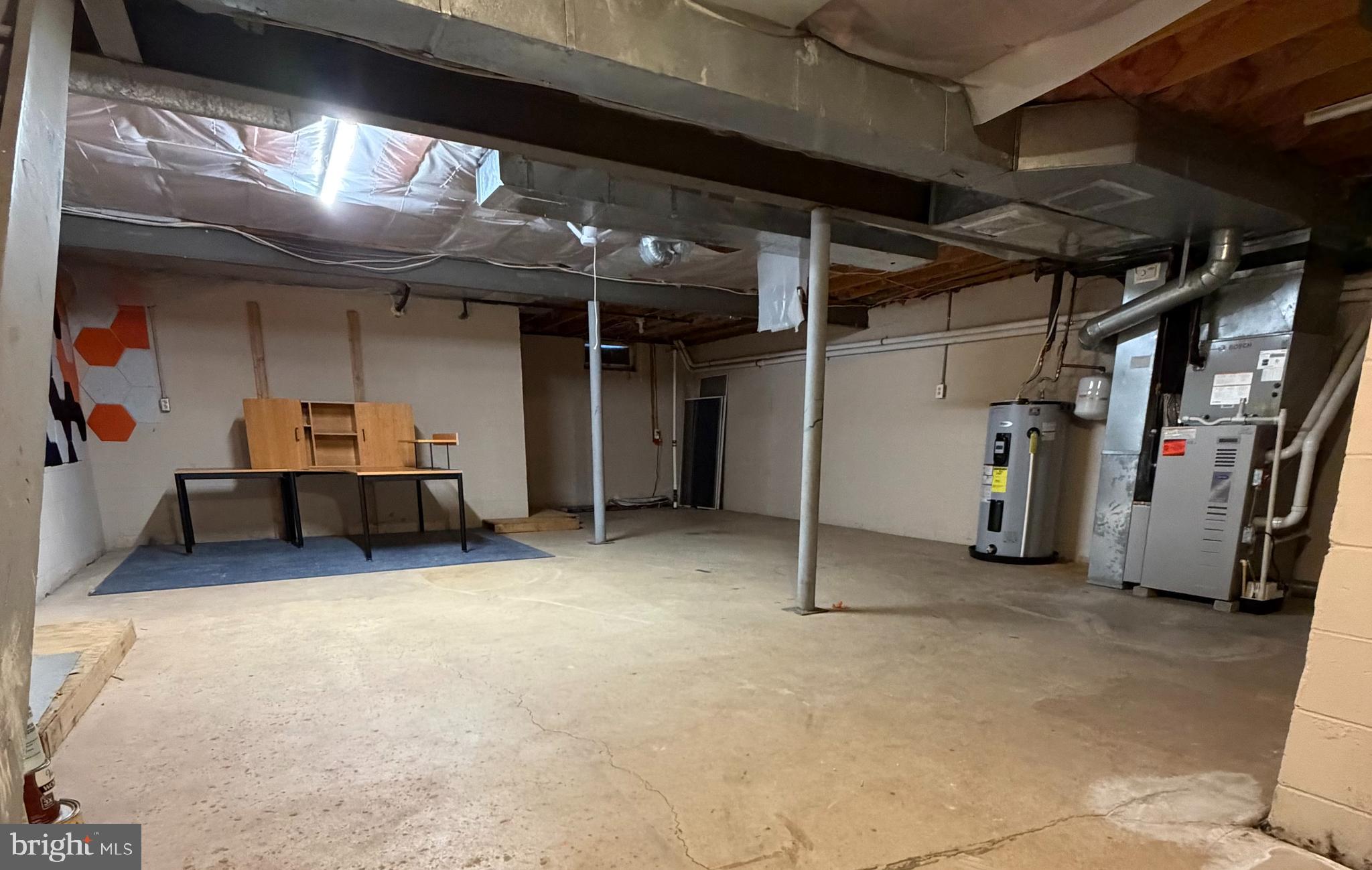 3 Kaylin Corner Chalfont, PA 18914 - Photo 25 of 27 a view of a big room with air conditioner duct and materials on floor