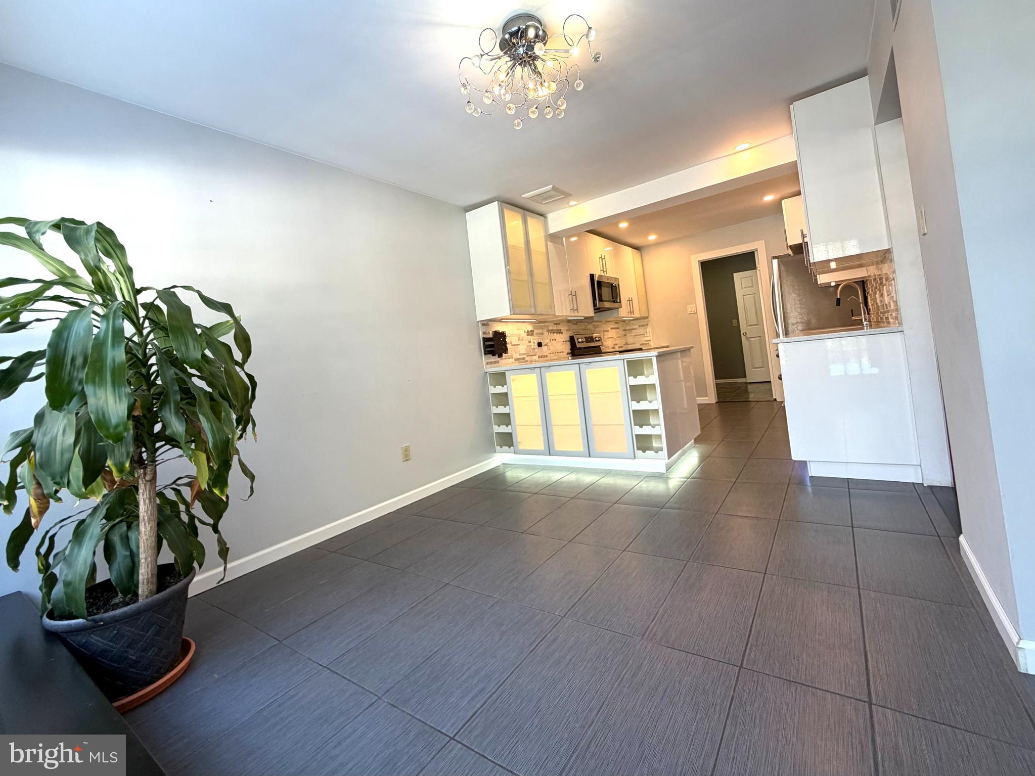 3 Kaylin Corner Chalfont, PA 18914 - Photo 3 of 27 a view of a kitchen with a potted plant
