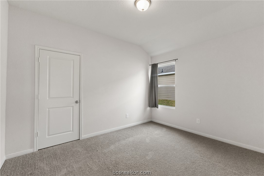 6018 Crest Bridge Bryan, TX 77807 - Photo 25 of 30 a view of an empty room with a window