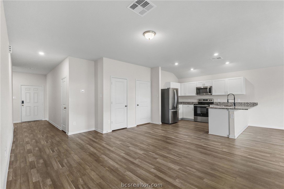 6018 Crest Bridge Bryan, TX 77807 - Photo 7 of 30 a view of kitchen with wooden floor