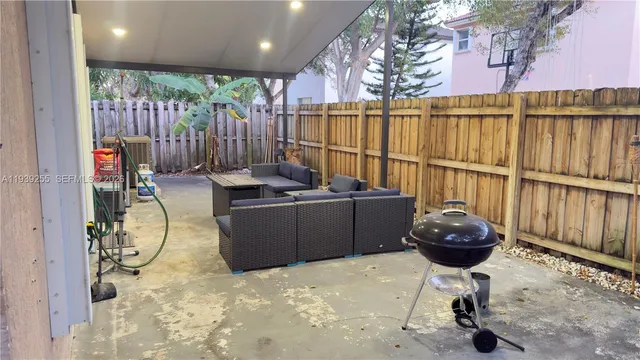 a room with furniture and a chandelier