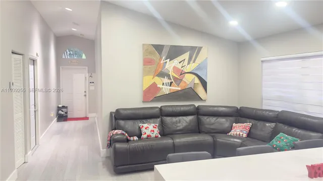 a living room with furniture and a couch