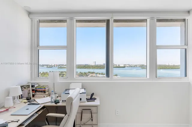 a room with furniture and a window