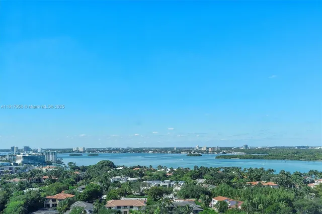 a view of city and green space