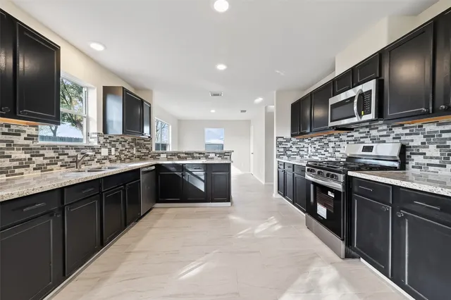a view of kitchen and a microwave oven