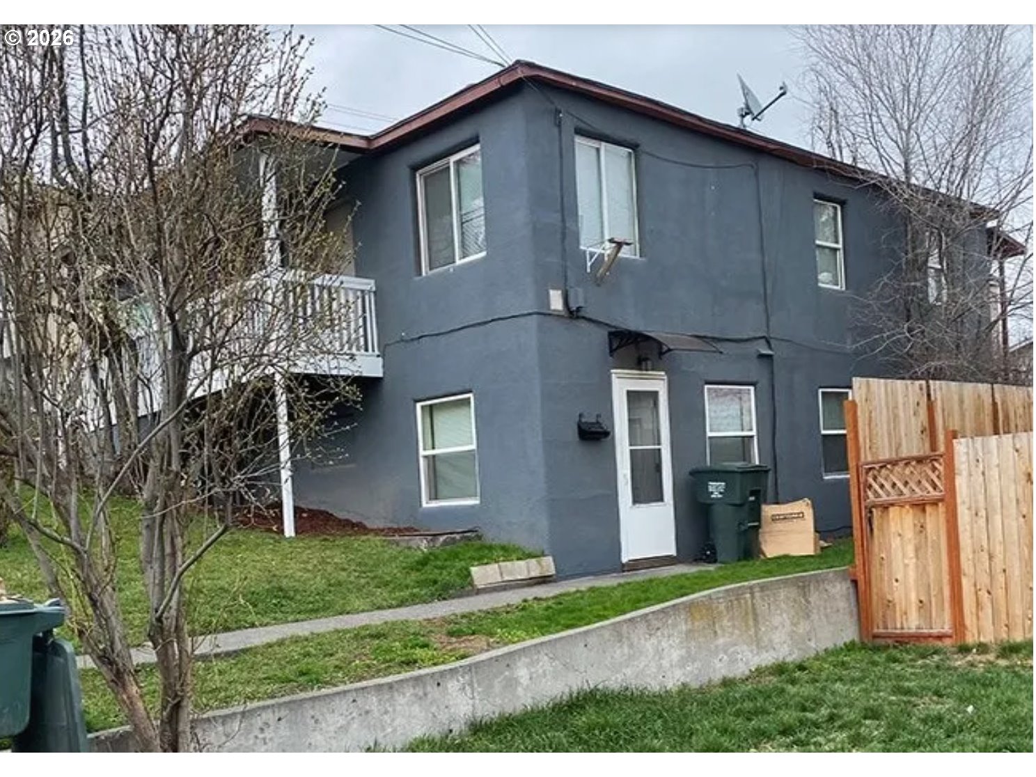 418 Northwest 9th Street Pendleton, OR 97801 - Photo 2 of 12 a front view of a house with a yard