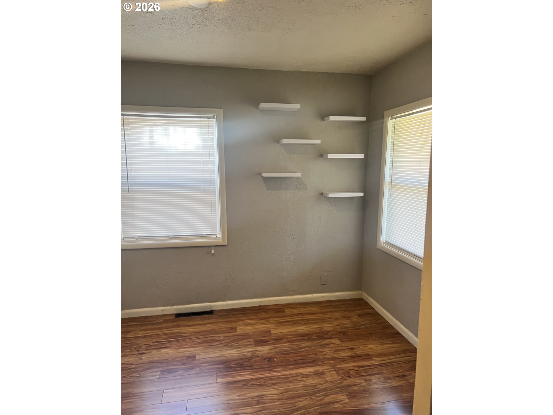 418 Northwest 9th Street Pendleton, OR 97801 - Photo 10 of 12 a view of empty room with wooden floor