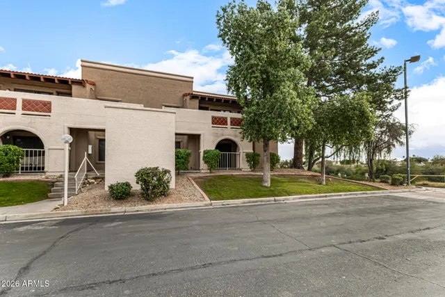 a view of house with outdoor space and trees