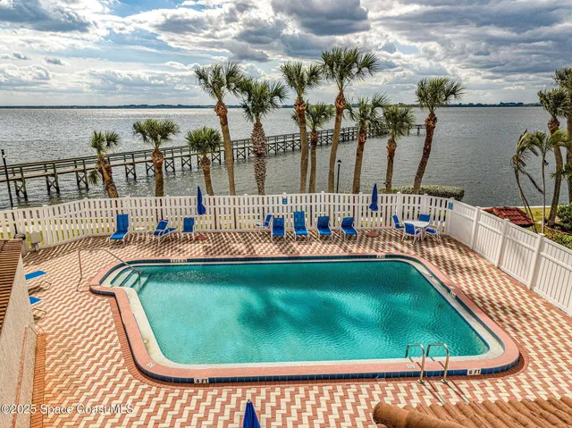 a view of yard with swimming pool