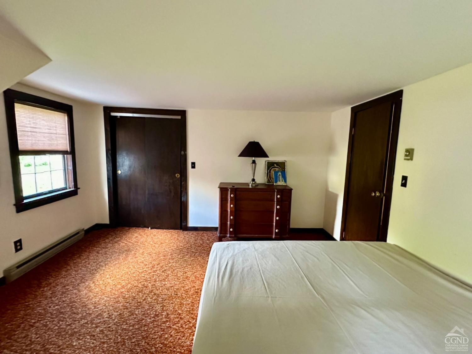 1020 Maplecrest Road East Jewett, NY 12424 - Photo 14 of 30 a bedroom with a bed and a dresser