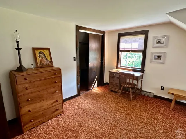 a room with furniture and a window