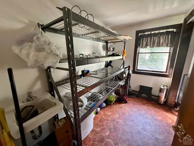 a bedroom with bunk beds and a window