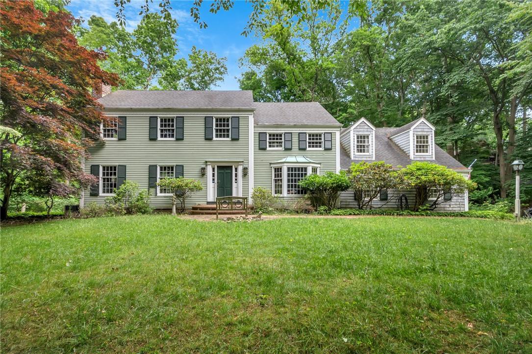 6 Short Path St. James, NY 11780 - Photo 1 of 1 Colonial inspired home featuring a front yard