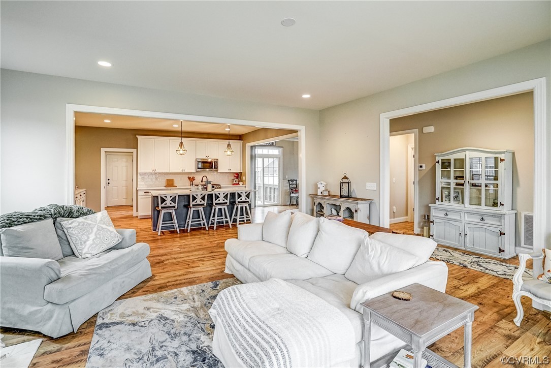 709 West Vaughan Road Ashland, VA 23005 - Photo 11 of 50 a living room with furniture and wooden floor