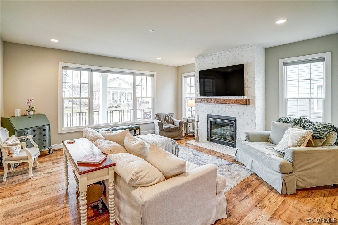 709 West Vaughan Road Ashland, VA 23005 - Photo 13 of 50 a living room with furniture fireplace and a flat screen tv