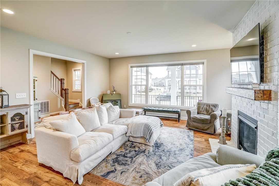 709 West Vaughan Road Ashland, VA 23005 - Photo 14 of 50 a living room with furniture fireplace and a large window