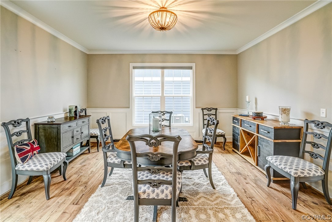 709 West Vaughan Road Ashland, VA 23005 - Photo 20 of 50 a view of a dining room with furniture window and outside view