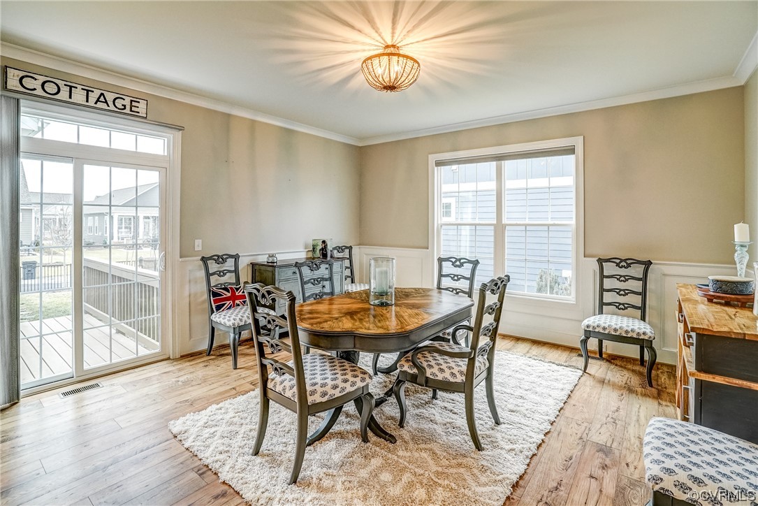 709 West Vaughan Road Ashland, VA 23005 - Photo 21 of 50 a dining room with furniture and wooden floor