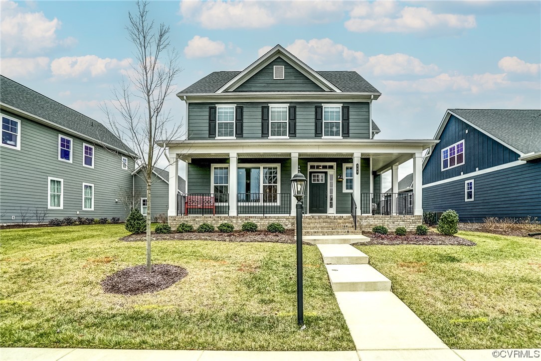 709 West Vaughan Road Ashland, VA 23005 - Photo 3 of 50 a front view of a house with a yard