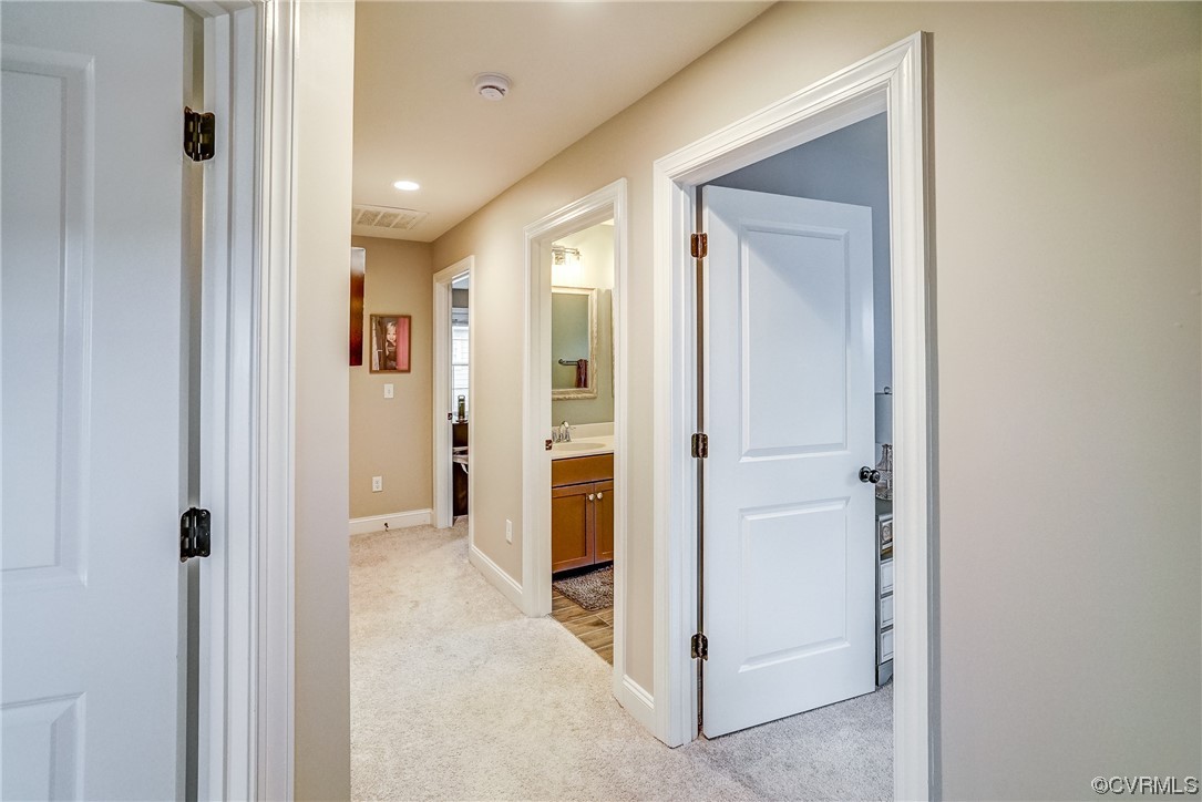 709 West Vaughan Road Ashland, VA 23005 - Photo 38 of 50 a view of a hallway with wooden shelves