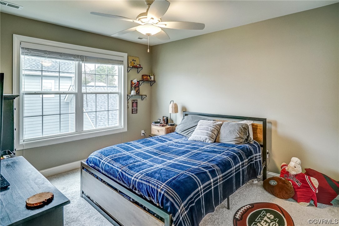 709 West Vaughan Road Ashland, VA 23005 - Photo 42 of 50 a bedroom with a bed and wooden floor