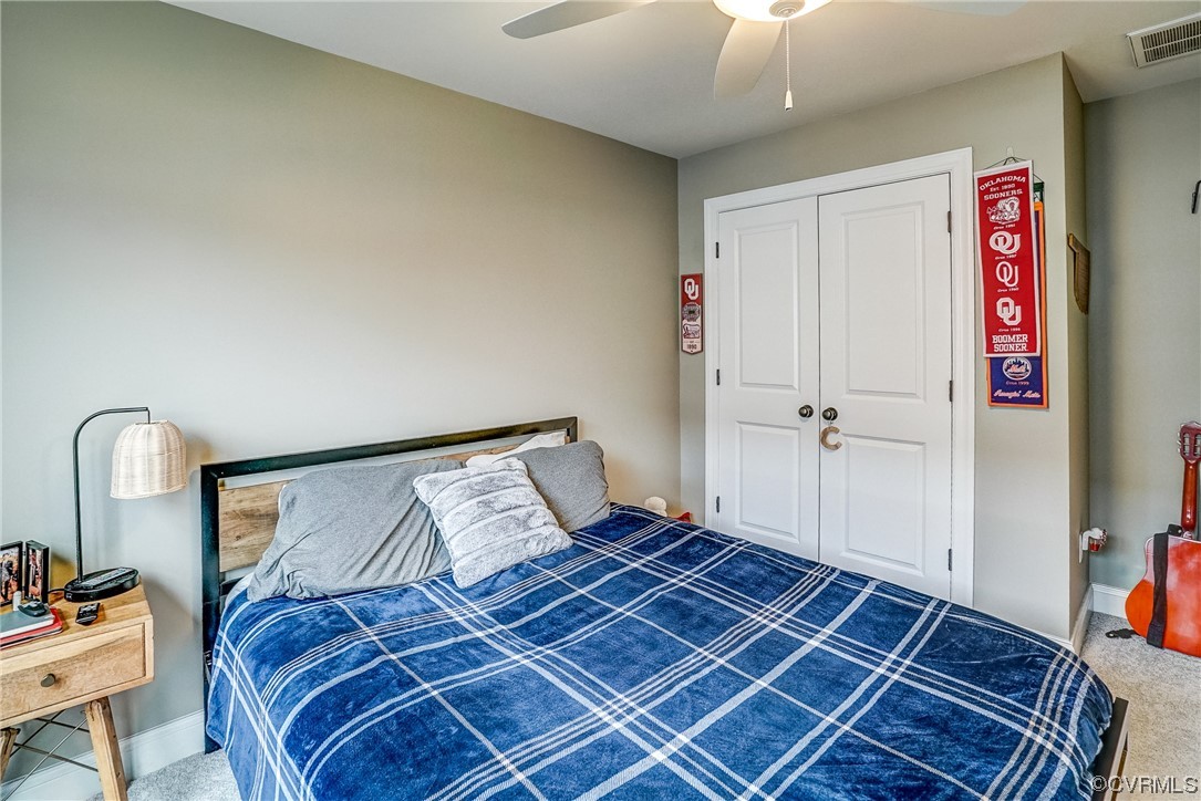 709 West Vaughan Road Ashland, VA 23005 - Photo 44 of 50 a bedroom with a bed and a mirror