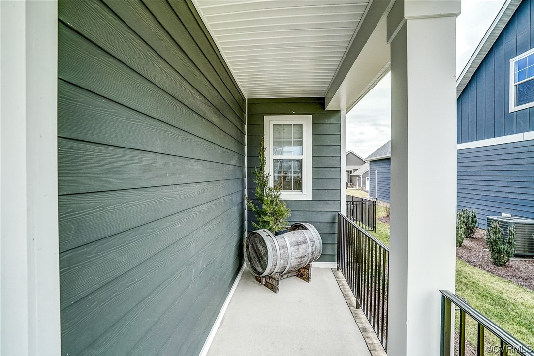 709 West Vaughan Road Ashland, VA 23005 - Photo 7 of 50 a view of a balcony with chair and the porch