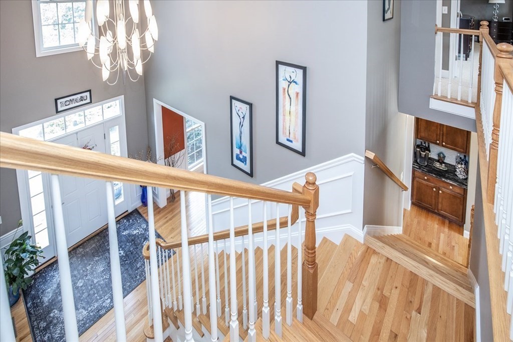 11 Sparrow Lane Danvers, MA 01923 - Photo 2 of 41 a view of staircase with white walls and a window