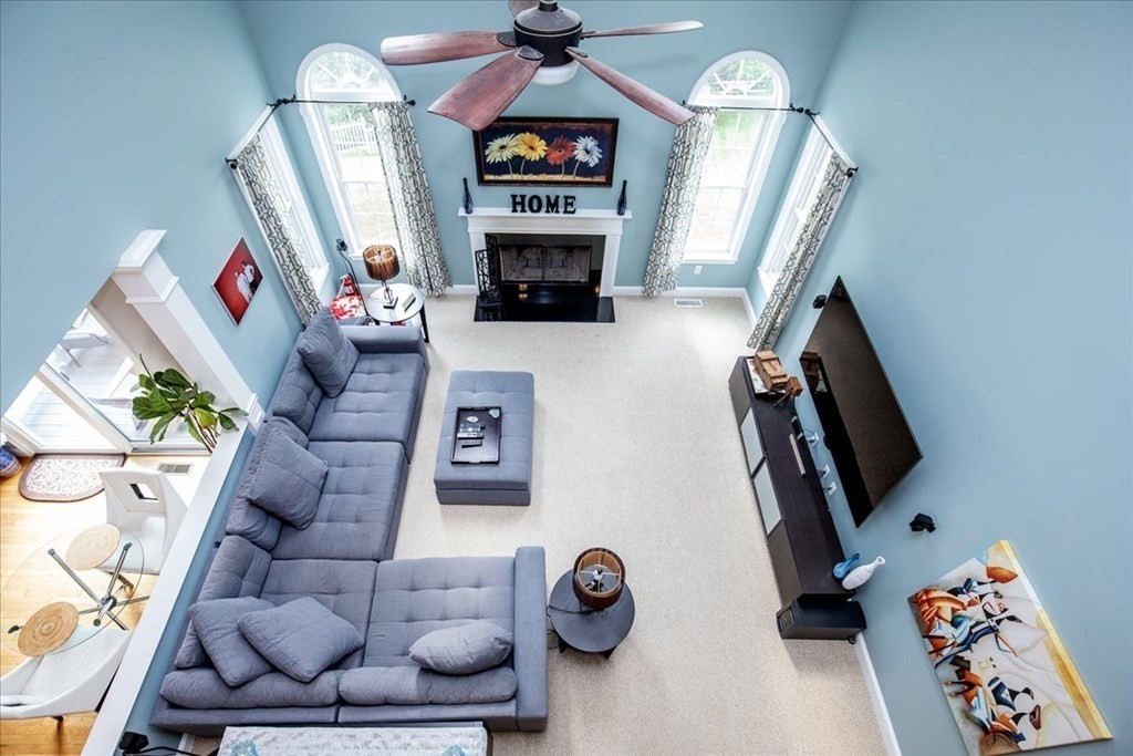 11 Sparrow Lane Danvers, MA 01923 - Photo 22 of 41 a view of living room with furniture and a fireplace