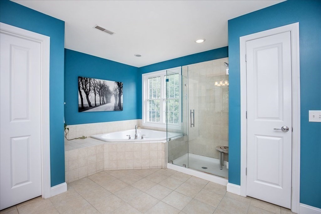 11 Sparrow Lane Danvers, MA 01923 - Photo 24 of 41 a spacious bathroom with a tub a shower and a sink