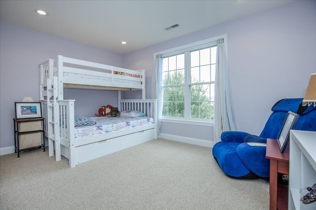 11 Sparrow Lane Danvers, MA 01923 - Photo 31 of 41 a bed room with furniture and a window