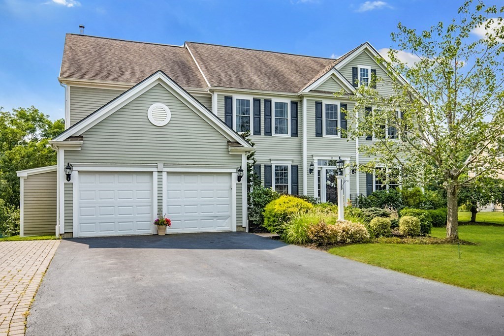 11 Sparrow Lane Danvers, MA 01923 - Photo 7 of 41 front view of a house with a yard