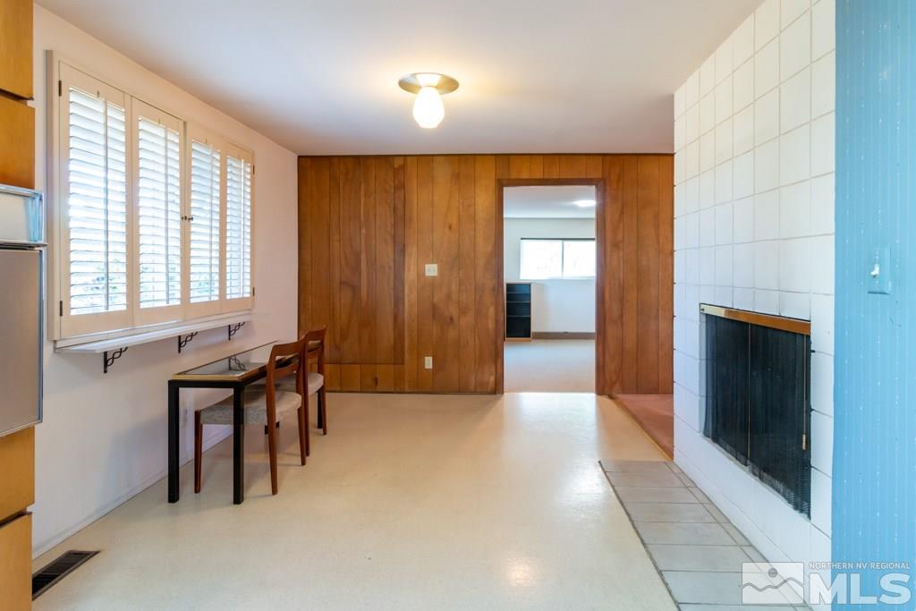 1355 Tacoma Way Reno, NV 89509 - Photo 20 of 22 a view of an empty room with a fireplace and a window