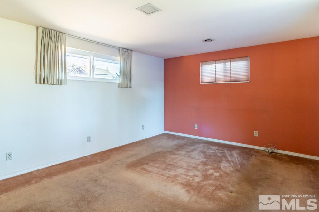 1355 Tacoma Way Reno, NV 89509 - Photo 5 of 22 an empty room with windows