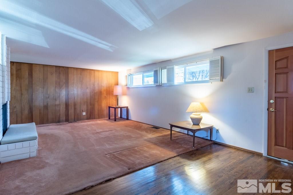 1355 Tacoma Way Reno, NV 89509 - Photo 6 of 22 a view of an empty room with window and hardwood floor
