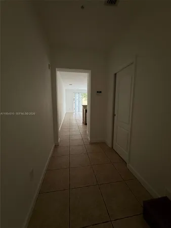 a view of hallway with an empty space