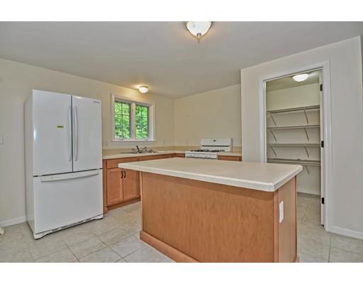 3 Forest Street Plympton, MA 02367 - Photo 13 of 42 a kitchen with a refrigerator and a sink