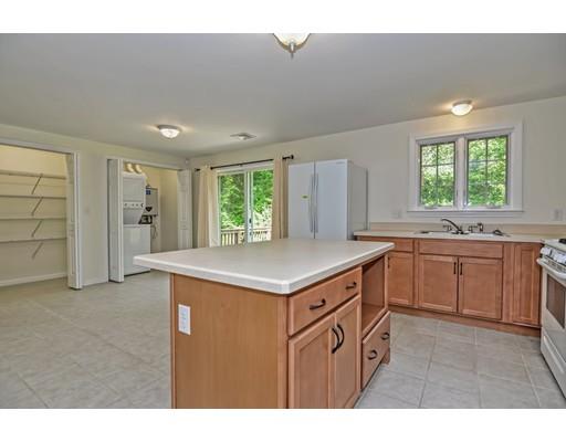 3 Forest Street Plympton, MA 02367 - Photo 14 of 42 a kitchen with a sink stove and cabinets