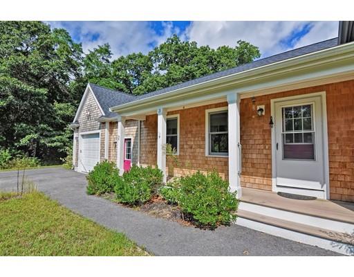 3 Forest Street Plympton, MA 02367 - Photo 5 of 42 a view of a house with potted plants and a large tree