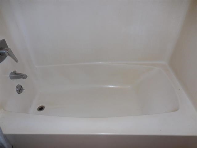 4435 Lower Honoapiilani Road, Unit 225 Lahaina, HI 96761 - Photo 16 of 35 a bathroom with a bathtub