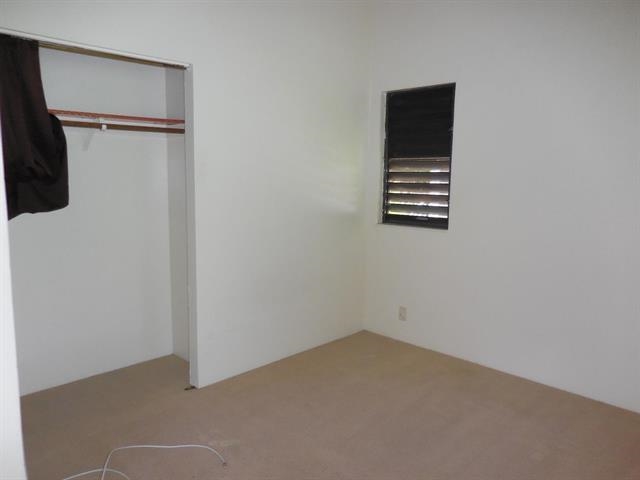 4435 Lower Honoapiilani Road, Unit 225 Lahaina, HI 96761 - Photo 17 of 35 an empty room with windows