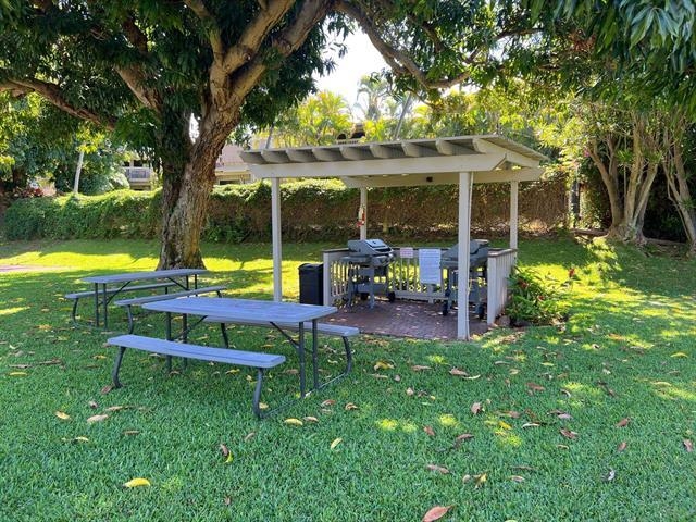 4435 Lower Honoapiilani Road, Unit 225 Lahaina, HI 96761 - Photo 19 of 35 a view of a house with a backyard patio and swimming pool