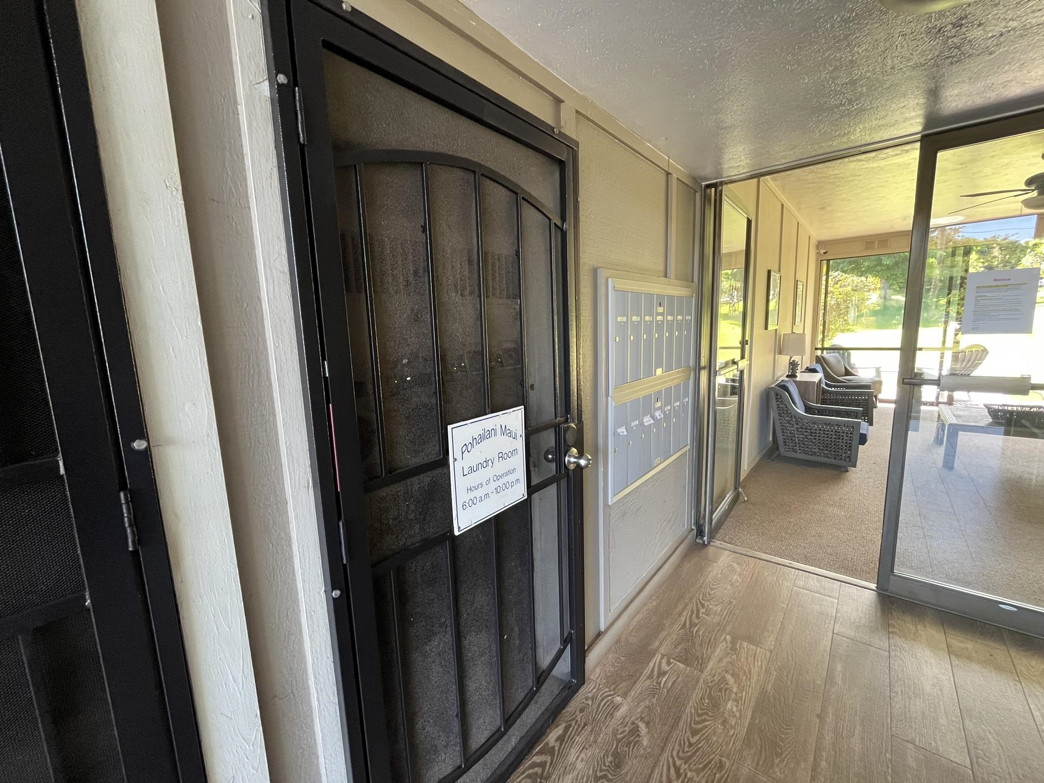 4435 Lower Honoapiilani Road, Unit 225 Lahaina, HI 96761 - Photo 29 of 35 a view of hallway with furniture and windows